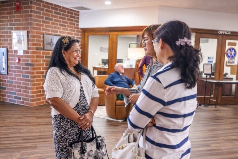 Church-members-conversing-and-having-fellowship-post-service